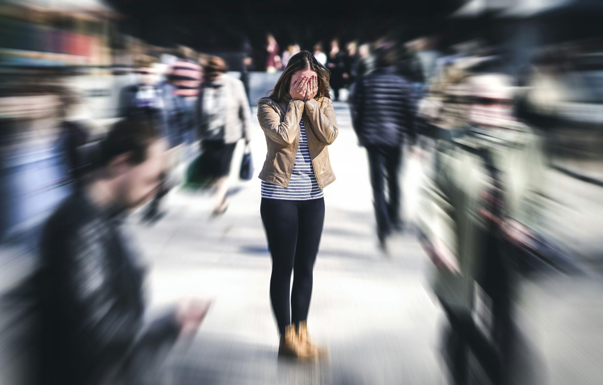 woman with anxiety in the crowd