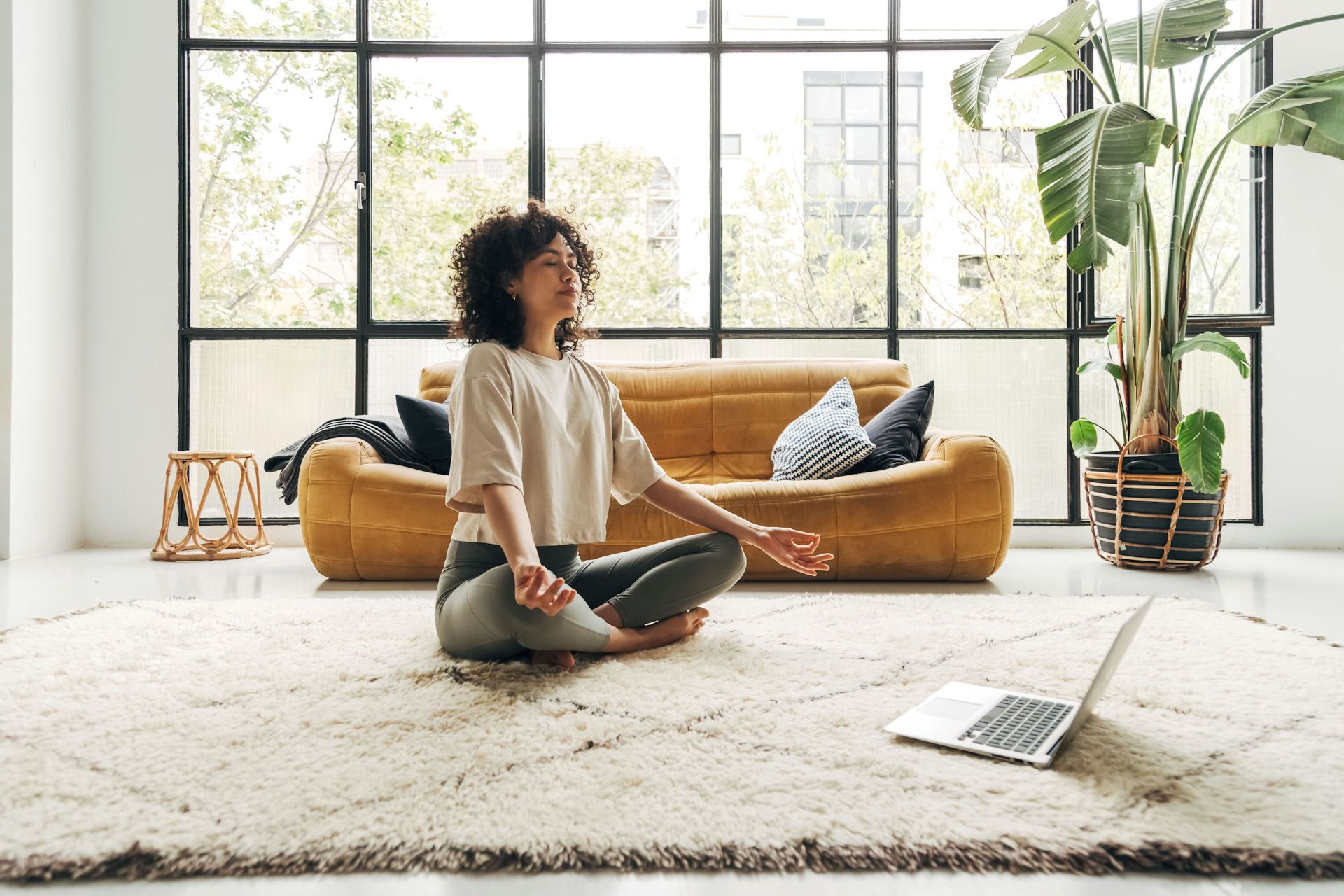 a-woman-meditating-at-home-practicing-selfcare