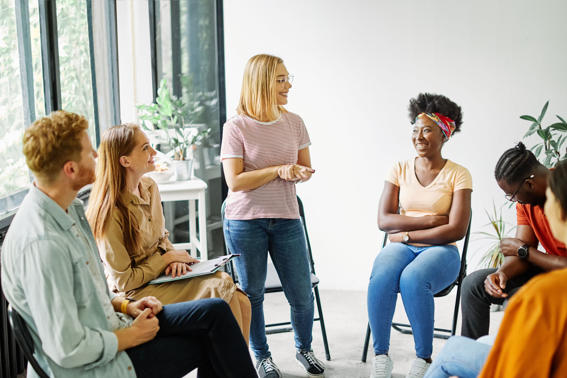 a-group-of-men-and-women-in-therapy