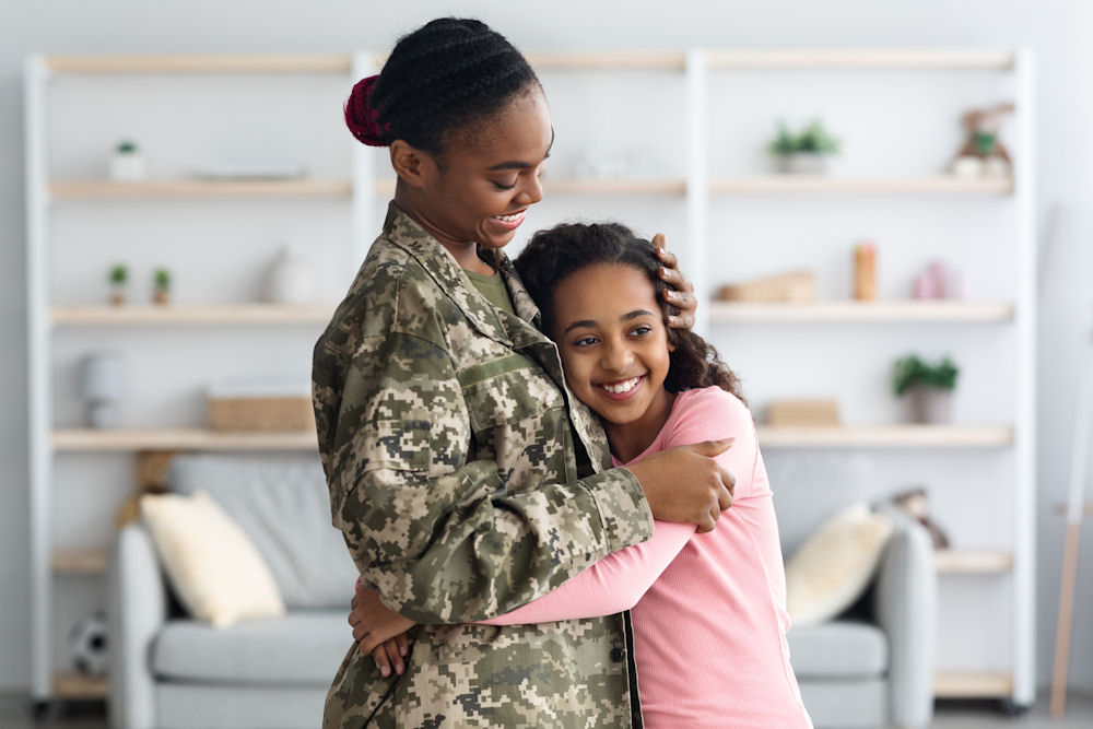 a-veteran-hugging-her-daughter