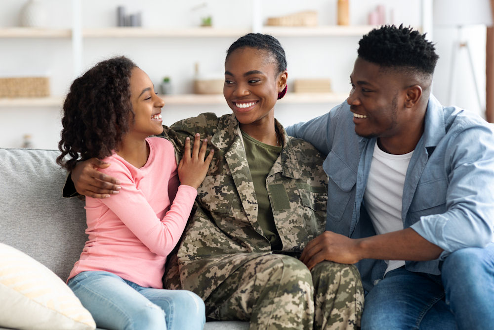 a-veteran-smiling-with-her-family