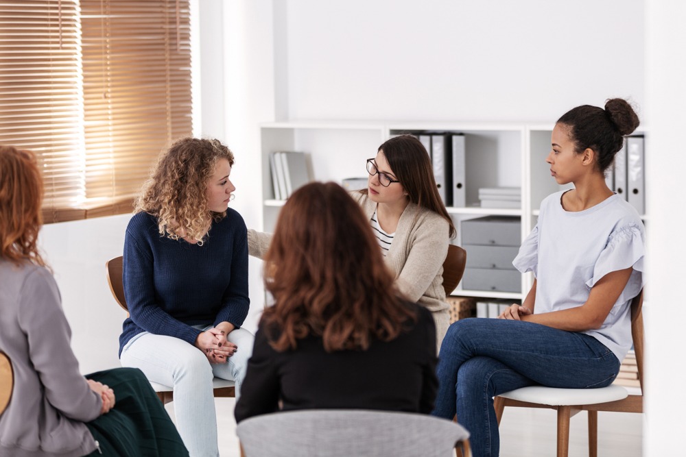 a group of women in therapy