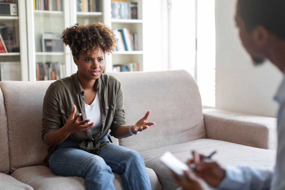 woman speaking with therapist