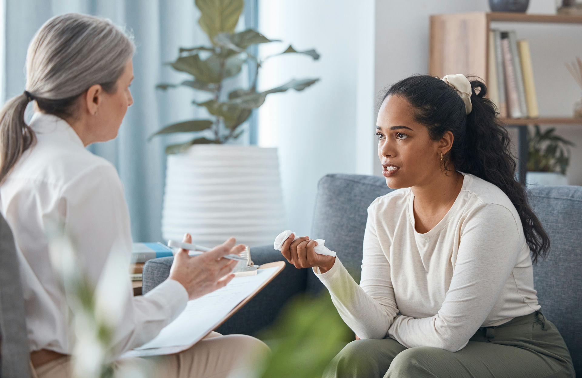 Female therapist supporting a trauma survivor during a DBT session focused on healing and emotional regulation.