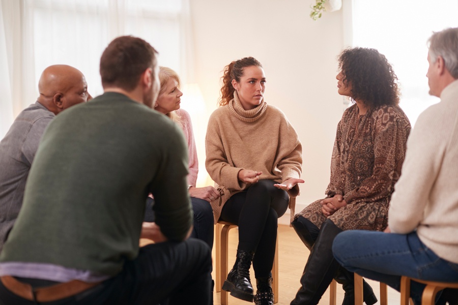 Family and professionals working together to support a loved one with schizophrenia.