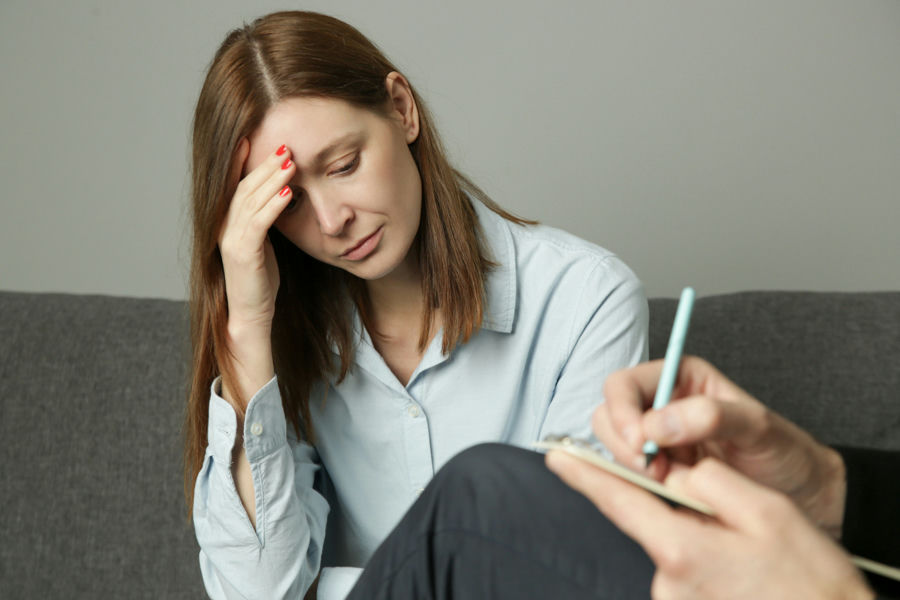 sad woman in therapy for mood disorder
