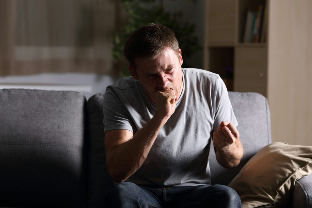 person sitting alone showing frustration and emotional tension illustrating how to tell if you have anger issues