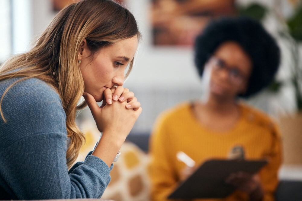 Mental health therapist helping a client recover from emotional abuse